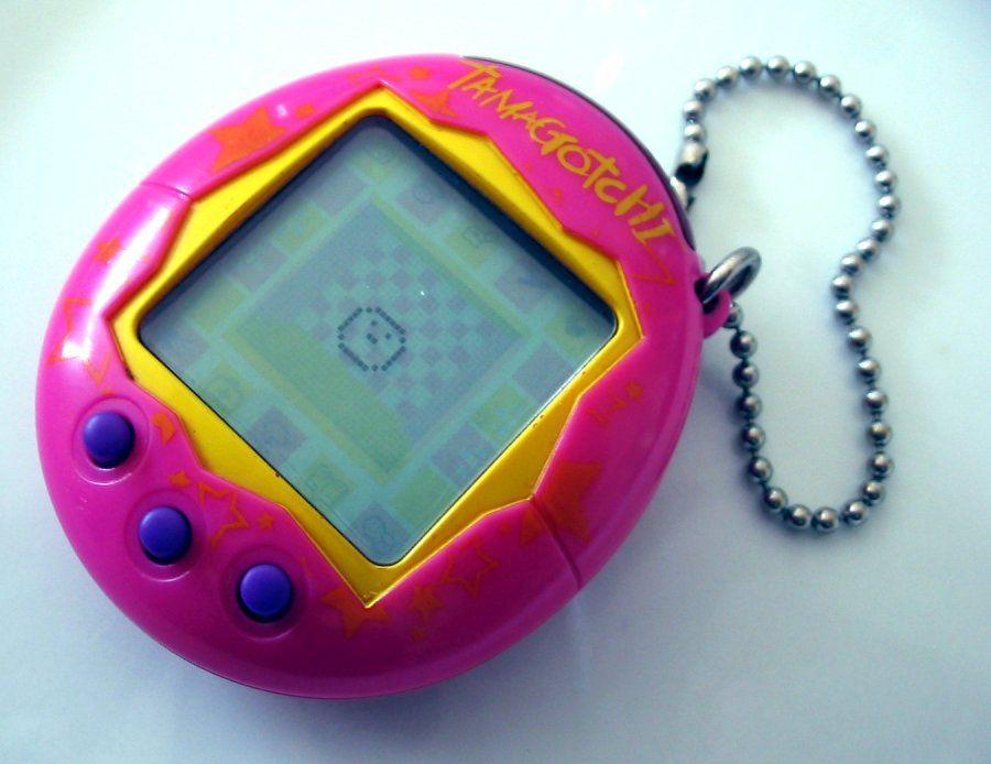 Ein Bild von einem Pinken Tamagotchi.